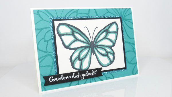 Karte mit Glitzerschmetterling